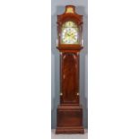 A George III mahogany longcase clock by Peter Birkhead of London, the 12ins arched brass dial with