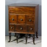 A late Georgian lady's mahogany enclosed wash stand with triple reeded edge to top, opening to