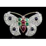 A modern gold and silvery coloured metal mounted gem set butterfly pattern brooch, the wings pave