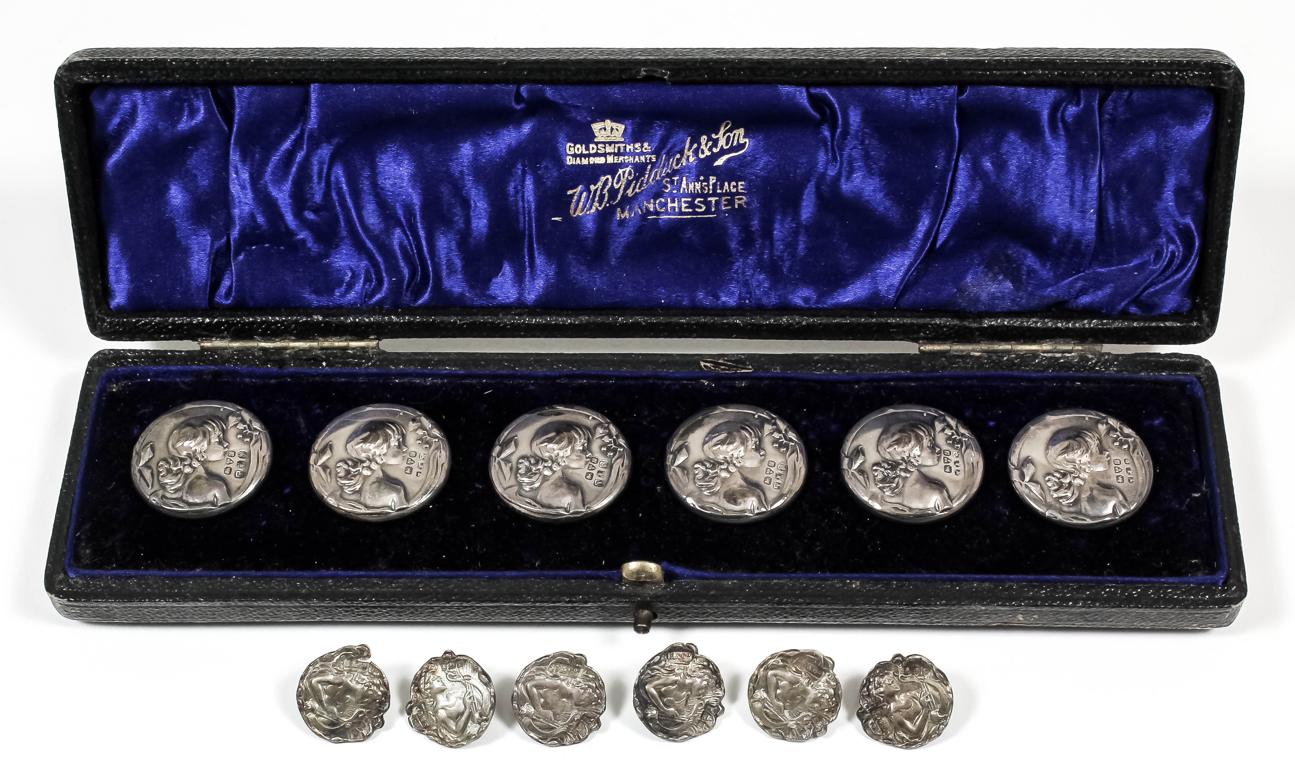 A set of six Edward VII silver circular buttons embossed with a shoulder length profile of a young