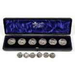 A set of six Edward VII silver circular buttons embossed with a shoulder length profile of a young