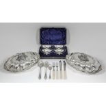 A set of four plated oval two-handled salts of Neo-classical design, with reeded mounts, high scroll