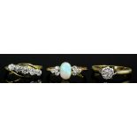 A 1950s 18ct gold and platinum mounted diamond solitaire ring, the illusion set stone of