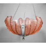 A 1930's pink frosted glass and chrome mounted circular ceiling light of moulded shell pattern