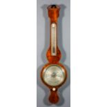 A 19th Century mahogany wheel barometer and thermometer by Cox of London, the 8ins diameter silvered