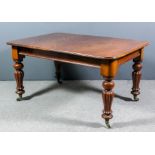A Victorian mahogany extending dining table with moulded edge to top and rounded corners, on