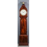 An early 19th Century mahogany longcase clock, the 12ins diameter painted domed metal dial with