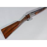 A 12 bore box lock ejector shotgun by Webley & Scott, serial No. 95424, the 28ins blued steel