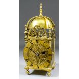 An early 20th Century brass cased "Lantern" clock in the "17th Century" style, the 5ins diameter