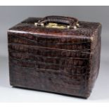 An alligator leather ladies vanity/jewellery case, the twin opening lid opening to reveal