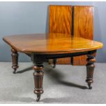 A late Victorian mahogany D-end extending dining table and three extra leaves for same, with moulded