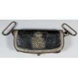 A Victorian "Sabretache", leather covered pouch decorated with silver thread to the edge and with