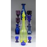 A 19th Century English blue glass panel cut decanter, 9.25ins high, a 19th Century "Bristol Blue"