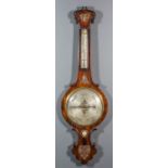 A Victorian rosewood cased wheel barometer and thermometer by D.Barloni of London, with 10ins