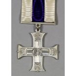 A George VI Military Cross (unnamed), in Royal Mint mauve leather covered case of issue and an