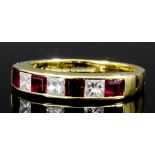 A modern 18ct gold ruby and diamond half hoop eternity ring set with four baguette cut rubies,