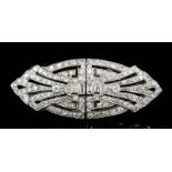 A 1920s silvery metal mounted all diamond set double dress clip or brooch at will of navette