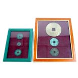 TWO FRAMED SUITES EACH OF THREE AGED CHINESE CASH