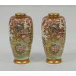 A PAIR OF MODERN JAPANESE KAHAYA KOBE SATSUMA PORCELAIN OVULAR VASES, well pained with pheasants and
