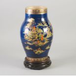 CROWN DEVON LARGE POTTERY VASE  decorated in the oriental taste, swollen form, gilt printed and