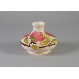 MODERN MOORCROFT MAGNOLIA PATTERN TUBE LINED POTTERY VASE, of squat form, decorated in colours on