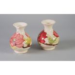 PAIR OF  MODERN MOORCROFT MAGNOLIA PATTERN TUBE LINED POTTERY VASES, of footed baluster form with