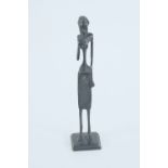 TWO AFRICAN STYLISED BRONZE TALL FIGURE OF A SEMI NAKED STANDING WOMAN, on stepped oblong plinth