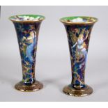 PAIR OF WEDGWOOD 'BUTTERFLY WOMAN' FAIRYLAND LUSTRE CHINA TRUMPET VASES, designed by Daisy Makeig-