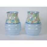 PAIR OF SHELLEY 'MELODY' PATTERN CHINA VASES, of ribbed, baluster form with waisted neck, printed in