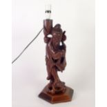 AN EARLY TWENTIETH CENTURY CHINESE CARVED WOODEN FIGURE OF AN IMMORTAL, 17 1/2" (44.5cm) high (as an