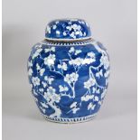 NINETEENTH CENTURY BLUE AND WHITE PORCELAIN GINGER JAR AND COVER, typical form, decorated with a