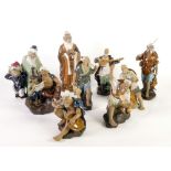 NINE MODERN 'MADE IN CHINA' MARKED BUFF COLOURED STONEWARE FIGURES of sacred and other figures, in