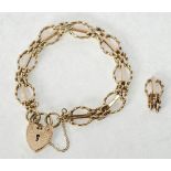 9CT GOLD FANCY GATE LINK BRACELET, WITH PADLOCK CLASP AND SPARE LINK, London 1978, 18.4g