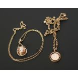 9CT GOLD CARVED SHELL CAMEO NECKLACE, in fancy pierced drop frame, on 9ct gold chain necklace,