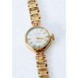 LADY'S 9CT GOLD CASED LIMIT BRACELET WATCH, 17 jewel incabloc, circular silvered dial with batons,