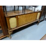 MODERN REPRODUCTION BURR WALNUT AND WALNUT CROSSBANDED RADIOGRAM CABINET WITH CABRIOLE LEGS