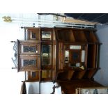 ARTS AND CRAFTS FLAVOUR CARVED WALNUTWOOD DISPLAY SIDE CABINET INSET WITH SEVEN MIRROR GLASS PANELS