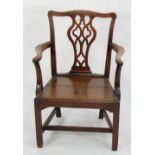 LATE EIGHTEENTH CENTURY OAK OPEN ARMCHAIR, with shaped  top rail, pierced splat and outswept arms,