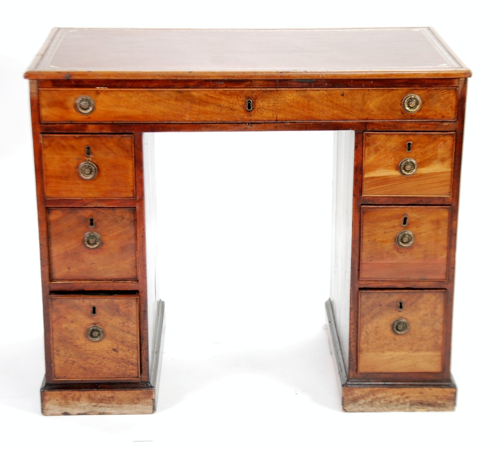 NINETEENTH CENTURY MAHOGANY TWIN PEDESTAL DESK, of small proportions, the moulded oblong top with