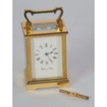 WALKER AND HALL, TWENTIETH CENTURY GILT BRASS CARRIAGE CLOCK, of typical form with reeded corners