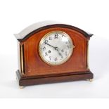 EARLY TWENTIETH CENTURY LINE INLAID MAHOGANY MANTEL  CLOCK, the 5" silvered Arabic dial powered