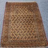 EASTERN PRAYER RUG, with rectangular mihrab, all over stylised flower head design on a light brown