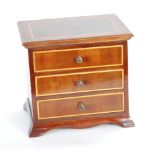 REPRODUCTION 'APPRENTICE PIECE' LINE INLAID MAHOGANY SMALL CHEST OF THREE DRAWERS, on splayed