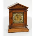 LATE VICTORIAN OAK CASED MANTEL CLOCK, the 7" Roman dial with silvered chapter ring, scroll engraved