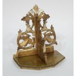 LATE 19th CENTURY CARVED GILT WOOD FOLDING WALL BRACKET, the shelf of canted oblong form with beaded