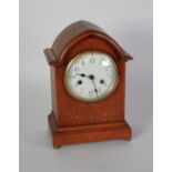 EARLY TWENTIETH CENTURY OAK CASED MANTEL CLOCK, by Gustav Becker, the 5" Arabic dial powered by an