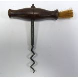 A 19th Century wooden handled steel corkscrew with a brush to one end of the handle