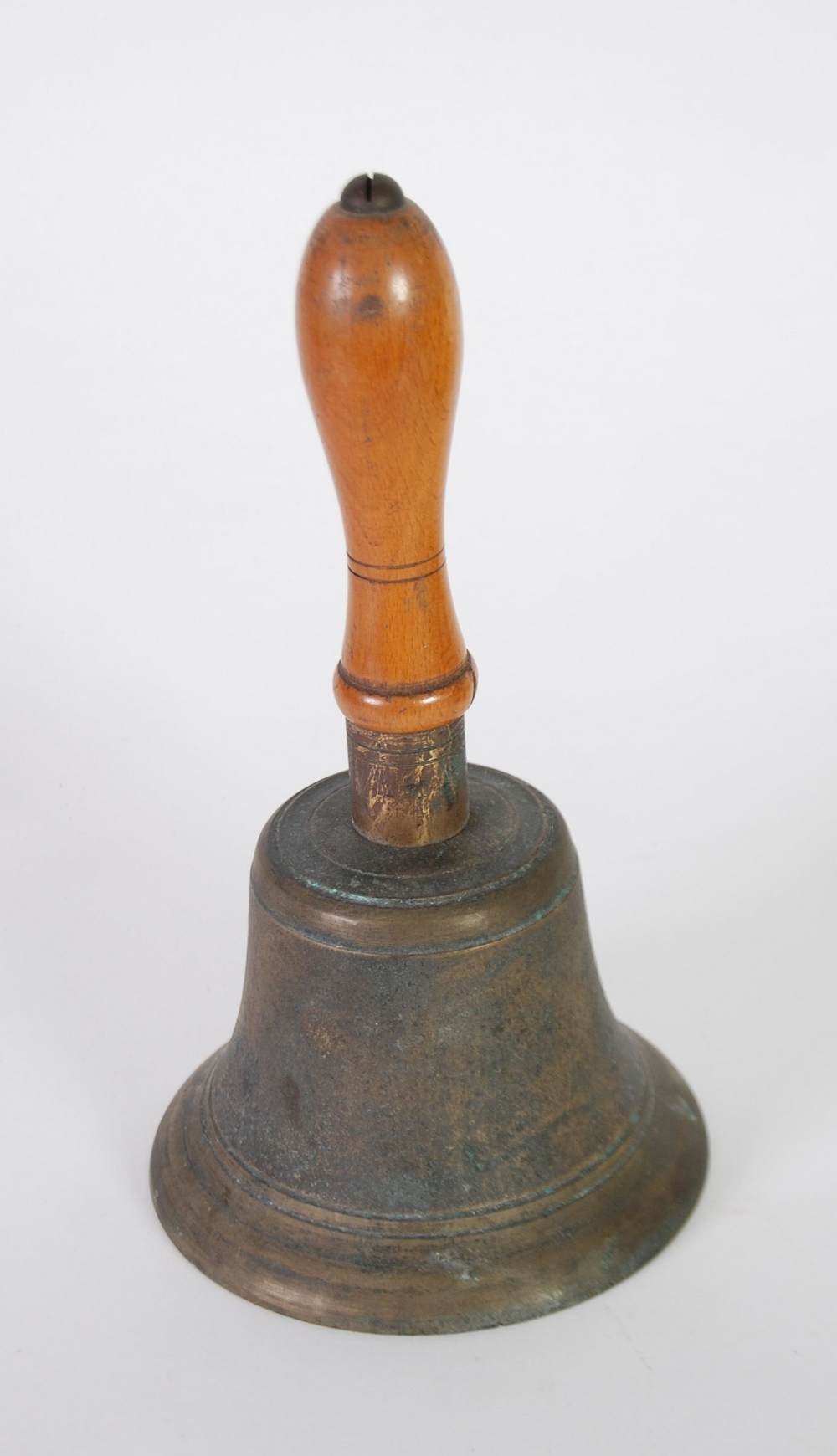 LARGE BRASS AND GILT METAL SCHOOL BELL, with turned blondwood baluster shaped handle, 10 1/2" *26.