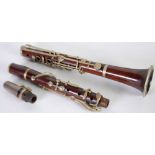 PRE-WAR STAINED PARTLY FIGURED WOOD FOUR PIECE CLARINET unbranded, having plated mounts, lacking one