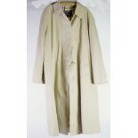 LADY'S BURBERRY FULL LENGTH COAT, stone coloured with Burberry check lining, size 18 Reg